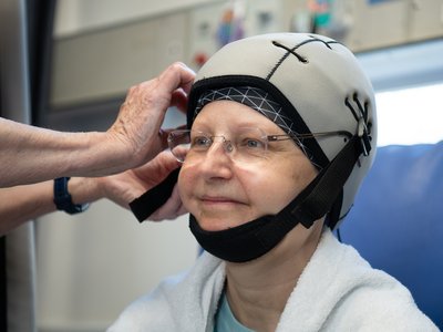 Patient with Scalp cooling cap